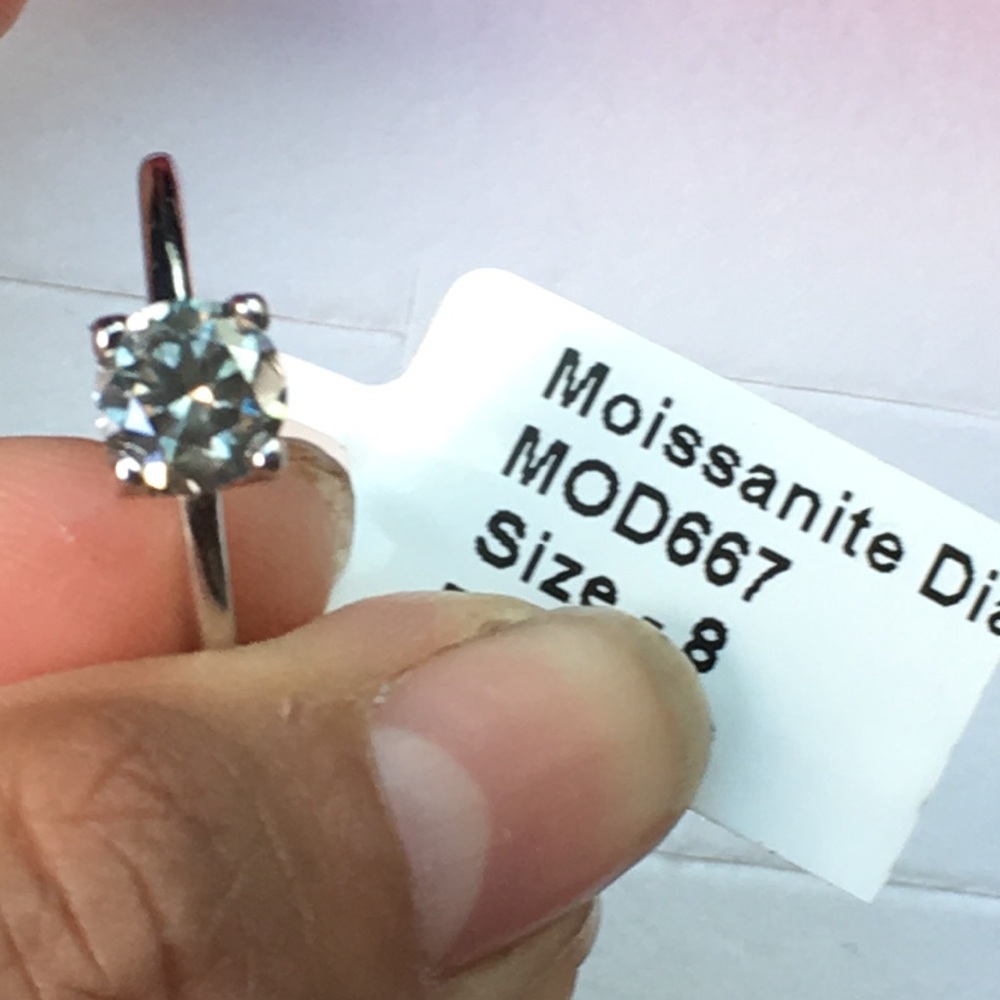 1.48 Moissanite solitaire sz 8